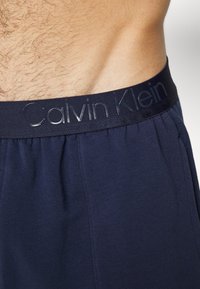 Calvin Klein Underwear GLOSS LOUNGE SLEEP PANT - Pyjamasbyxor - blue