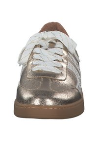 Metallic gold sneaker with white laces, featuring perforated sides and a brown suede ankle accent. Flat rubber sole.
