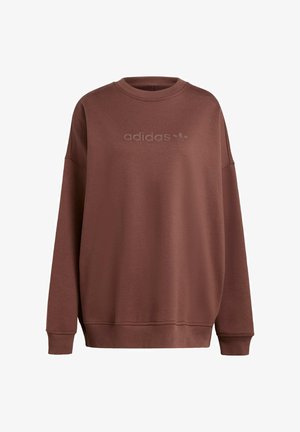 Brown sweatshirt with a crew neck and long sleeves. Features a tonal 'adidas' logo across the chest. Made from soft fabric with a smooth texture.