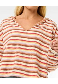 Felpa a righe con scollatura a V, con righe di colori rosso, marrone, crema e pastello. Tessuto a maglia testurizzato e maniche lunghe.
