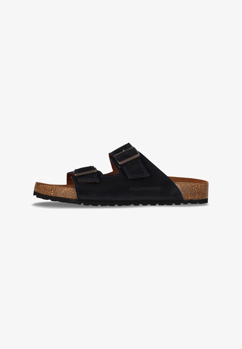 Black leather sandals with two adjustable straps, cork midsole, and textured rubber outsole, featuring blue stitching accents.
