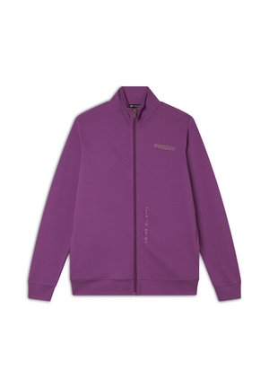 Giacca a zip viola realizzata in tessuto morbido. Presenta un colletto alto, polsini a costine e il logo "FRIDDY" stampato in metallo sul petto.