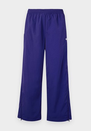 adidas Originals ADILENIUM SEASONAL 3 OVERSIZED SUPERSTAR TRACK - Tracksuit bottoms - night indigo