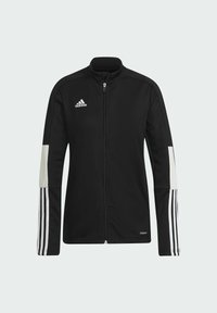 Veste zippée noire Adidas avec logo blanc sur la poitrine, épaules blanches et trois bandes blanches le long des manches inférieures.