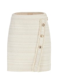 Beige geweven mini-jurk met een gestructureerd patroon, zijknopen en een rafelige zoom. Bevat een discrete ritsluiting.
