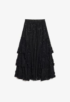 Jupe noire à couches en dentelle texturée, présentant des volants avec une finition effilochée et des paillettes éparpillées pour plus de détails.