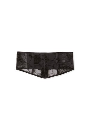 Collana aderente nera in pizzo con motivo floreale, caratterizzata da una texture semi-trasparente e bordi cuciti per dare struttura. La forma lunga e appuntita valorizza il design.