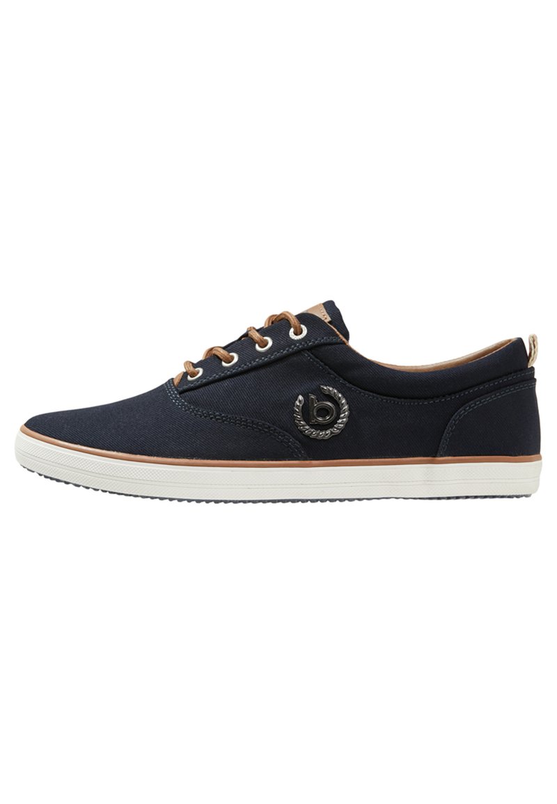 Navy canvas sneakers with brown lace accents, round toe, contrasting white rubber sole, and black logo detail on the side.