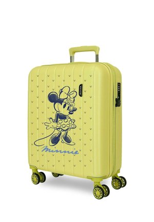Maleta rígida amarilla con diseño de Minnie Mouse, firma azul, cuatro ruedas dobles giratorias y asa extensible.