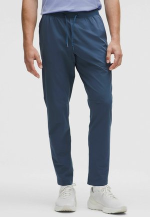 REGULAR - Spodnji deli trenirk - blue twill