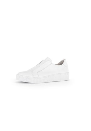 White slip-on sneaker made of smooth leather with elastic side panels, round toe, and textured rubber sole for grip.