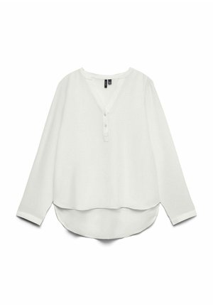 Blusa blanca de manga larga con cuello en V, tapeta de botones, dobladillo redondeado más largo en la parte trasera, y un ajuste casual y suelto.
