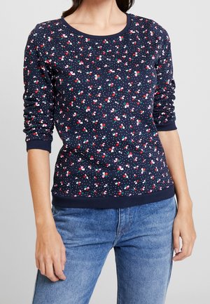 Marinefarbener Sweatshirt im Langarm-Design mit einem Blumen- und Punkte-Muster, rundem Ausschnitt, gerippten Bündchen und Saum. Der Stoff wirkt weich und elastisch.