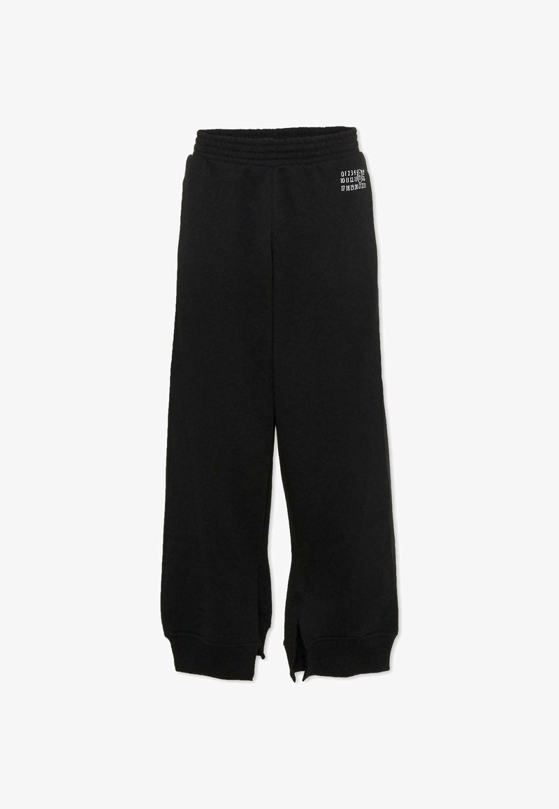 Pantalon de survêtement noir à jambes larges avec taille élastique, petit logo numérique blanc près de la taille, et fentes latérales aux ourlets.