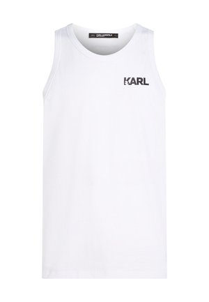 Top bianco senza maniche realizzato in cotone con scollo rotondo. Presenta una stampa nera del logo sul petto. Design semplice.