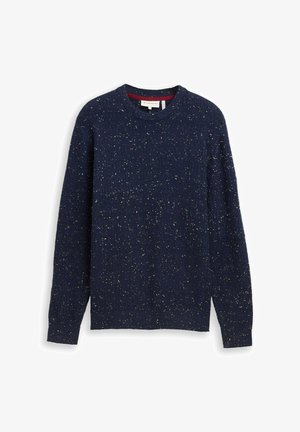 Granatowy sweter z teksturowanym splotem, z wielokolorowymi wstawkami. Okrągły dekolt i długie rękawy. Miękka tkanina, swobodny fason.