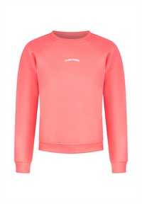 Korallfärgad sweatshirt med långa ärmar och rundad halsringning, med en vit "SMILODOXY"-logotyp centrerad på framsidan. Slät tygtextur.