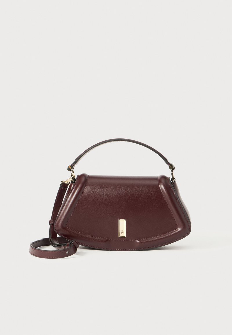 Burgundy leather handbag with a structured design, top handle, and adjustable strap. Features a gold-tone hardware accent on the front.