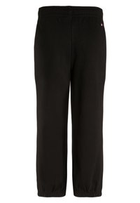Czarne dresy z elastycznym paskiem w talii i mankietami. Wykonane z miękkiego, strukturalnego materiału, z małym logo z tyłu.