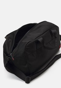 HUGO ETHON HOLDALL UNISEX - Víkendová taška - black