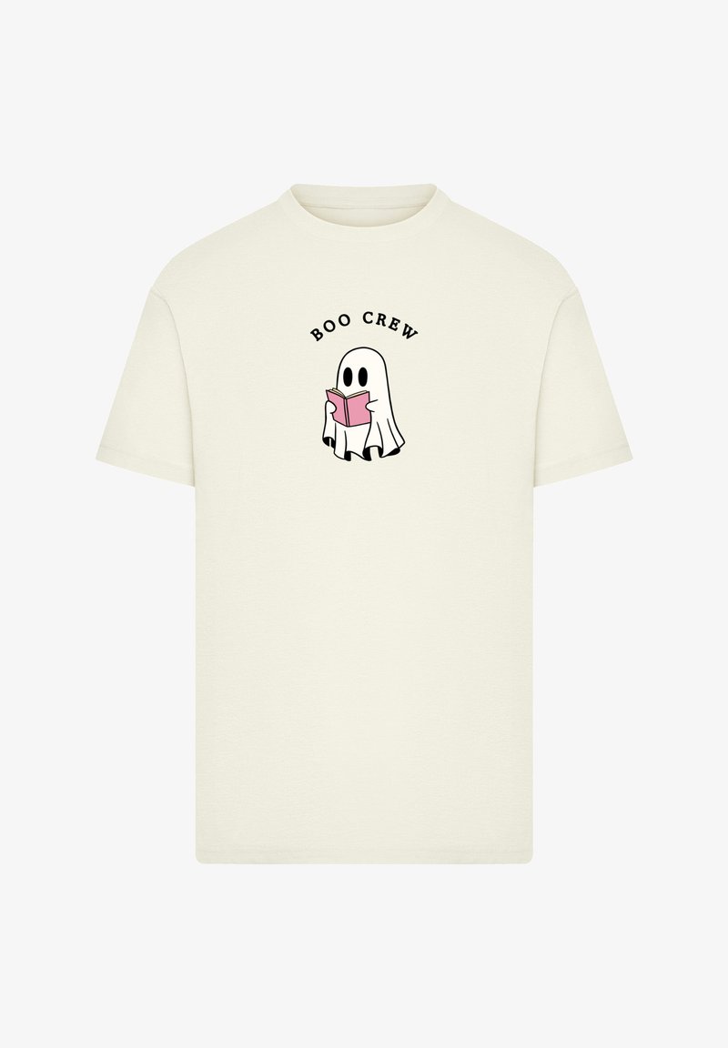 Cream-colored t-shirt made of cotton with short sleeves. Features a cartoon ghost reading a pink book and the text "BOO CREW" above it.