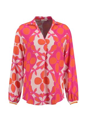 Blouse à manches longues avec un motif floral abstrait rose et orange, col en V et poignets froncés.