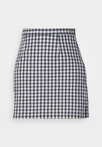 Schwarz-weißer Rock im Gingham-Muster mit hoher Taille, geplottetem Design und gerader Silhouette. Sanfte Textur, ohne sichtbare Beschläge.