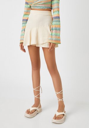 Falda acampanada - beige