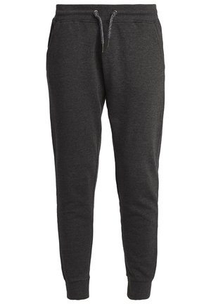 Pantaloni jogger grigi in tessuto morbido, con vita elasticizzata e cordino, tasche laterali e polsini a costine alla caviglia.