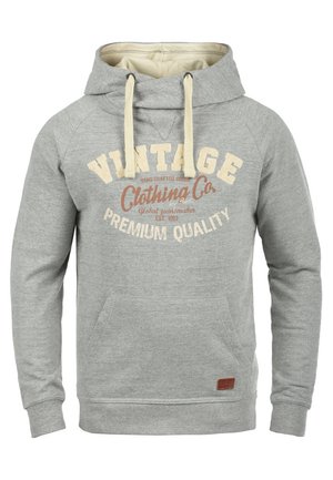 Grijze hoodie met een crèmekleurige binnenkant, met een logo in vintage-stijl. Inclusief trekkoorden, een voorkeurszak en ribgebreide manchetten.
