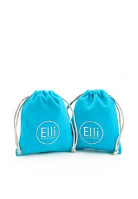 Tirkizne platnene torbe s vezicom, glatke teksture, s kružnim bijelim logom "Elli by Julie & Grace" sprijeda.
