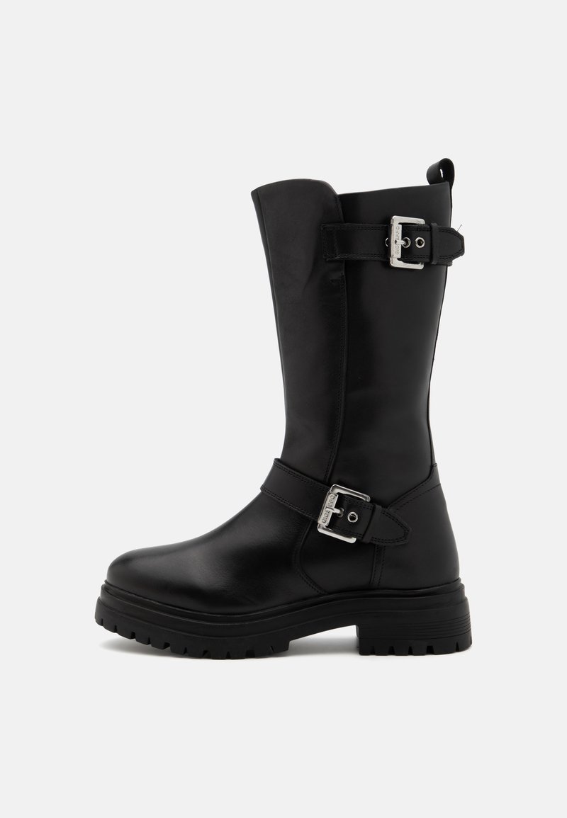 Black leather knee-high boots with a rounded toe, buckle accents on the side, and a thick rubber sole featuring a textured tread pattern.