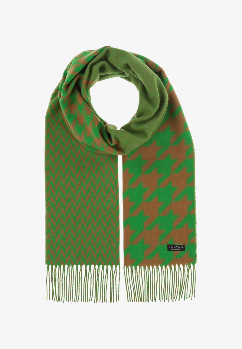 Roheline sall, millel on pruun houndstooth mustriga, mille otstes on frindid. Valmistatud pehmest ja tekstuursest kangast.