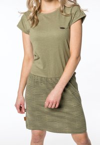 Olive green dress with a short sleeve top and a striped, textured skirt. Features a rounded neck and elastic waistband. Small fabric label on side.