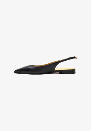 Black leather slingback flat shoe with a pointed toe, minimalistic design, smooth texture, and a small heel. No visible patterns or accents.