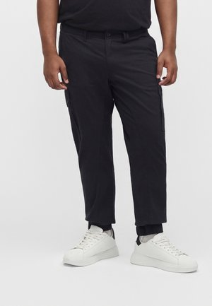Jack & Jones, JJIPAUL JJFLAKE - Карго панталони - black