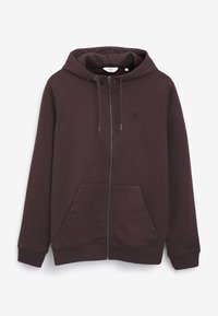 Haut de survêtement zippé bordeaux avec une capuche à cordon, des poches kangourou, des poignets côtelés et un petit logo brodé sur la poitrine gauche. Texture lisse.