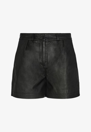 Black leather shorts with a smooth texture, high waist, and front pleats. Features a classic design and minimalistic style without additional embellishments.