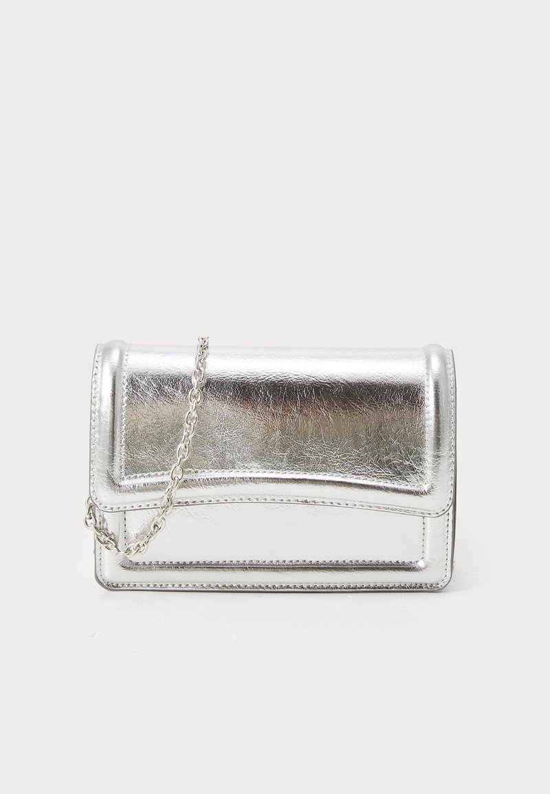 Silver metallic clutch bag with a smooth texture, flap closure, and a chain strap. Features a structured rectangular design and stitched accents.