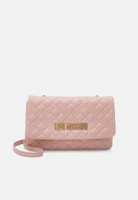 Pink quilted synthetic leather crossbody bag with gold "LOVE MOSCHINO" logo, flap closure, and detachable strap. Smooth texture with diamond pattern.