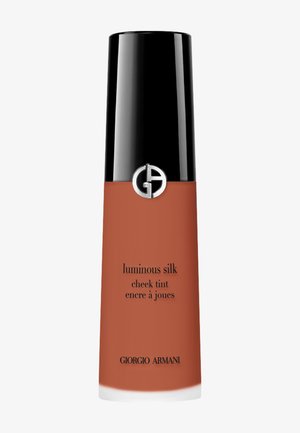 Teint de joues Luminous Silk de Giorgio Armani en teinte terracotta avec un capuchon noir et un logo argenté sur fond blanc.