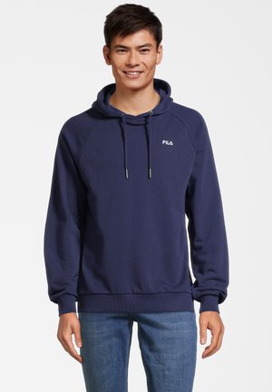 Felpa con cappuccio di colore blu navy, dotata di tasca a marsupio, polsini e orlo a costine, e cordini con punte in argento. Logo Fila sul petto.