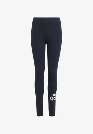 Leggings navy de tela elástica, con una cintura alta y un logo blanco de Adidas cerca de la parte inferior de la pierna izquierda. Textura suave.