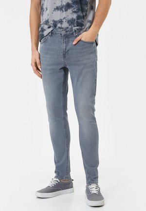 - Jeansy Skinny Fit