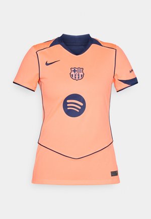 Nike FC Barcelona krekls oranžā krāsā ar tumši zilām akcentiem, ar apļa kaklu, kluba logo un centrālu Spotify grafiku. Strukturēta auduma.