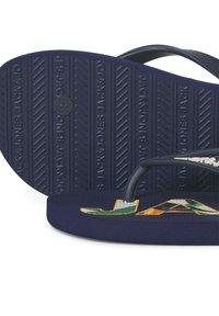 Infradito in gomma navy con suole testurizzate, caratterizzate da un colorato logo "J" sul plantare e una fascia nera liscia.