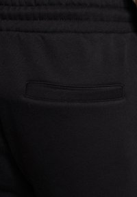 DEF Trainingsbroek - black