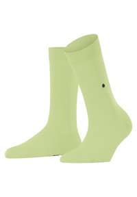 Chaussettes vert lime arrivant à la cheville en mélange de coton doux, avec un bord côtelé et un petit logo noir sur le côté.