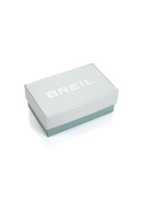 Scatola rettangolare argento e teal con una finitura texturizzata, caratterizzata dal testo "BREIL" in bianco sul coperchio. Chiusa, con una base liscia.