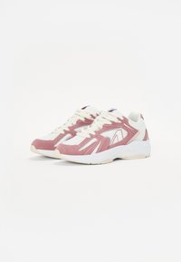 Pink suede and white mesh sneakers with flat laces, textured details, and a tapered design. Rubber sole with cream accents.